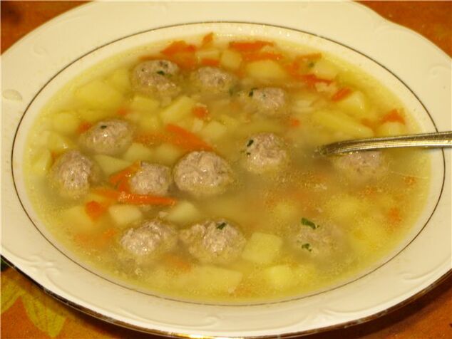 Soup with vegetables and meatballs - a light meal in the weekly diet menu